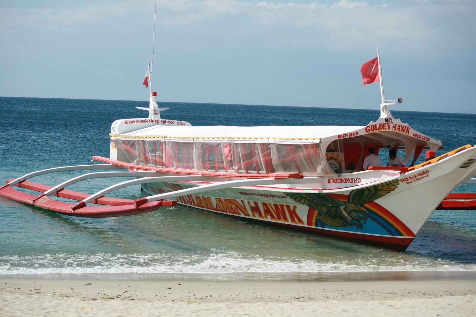 things to do in Puerto Galera, island hopping in Puerto Galera