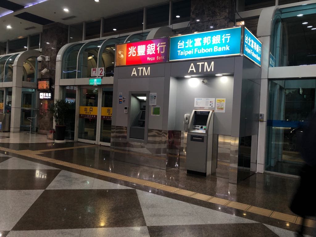 how to get from Kaohsiung airport to city center. ATMs in Kaohsiung airport
