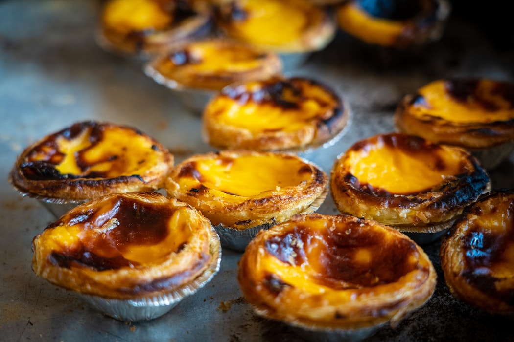 PASTEL DE NATA, Portuguese Food, Portuguese cuisine, traditional Portuguese food, food in Portugal, Portuguese dishes