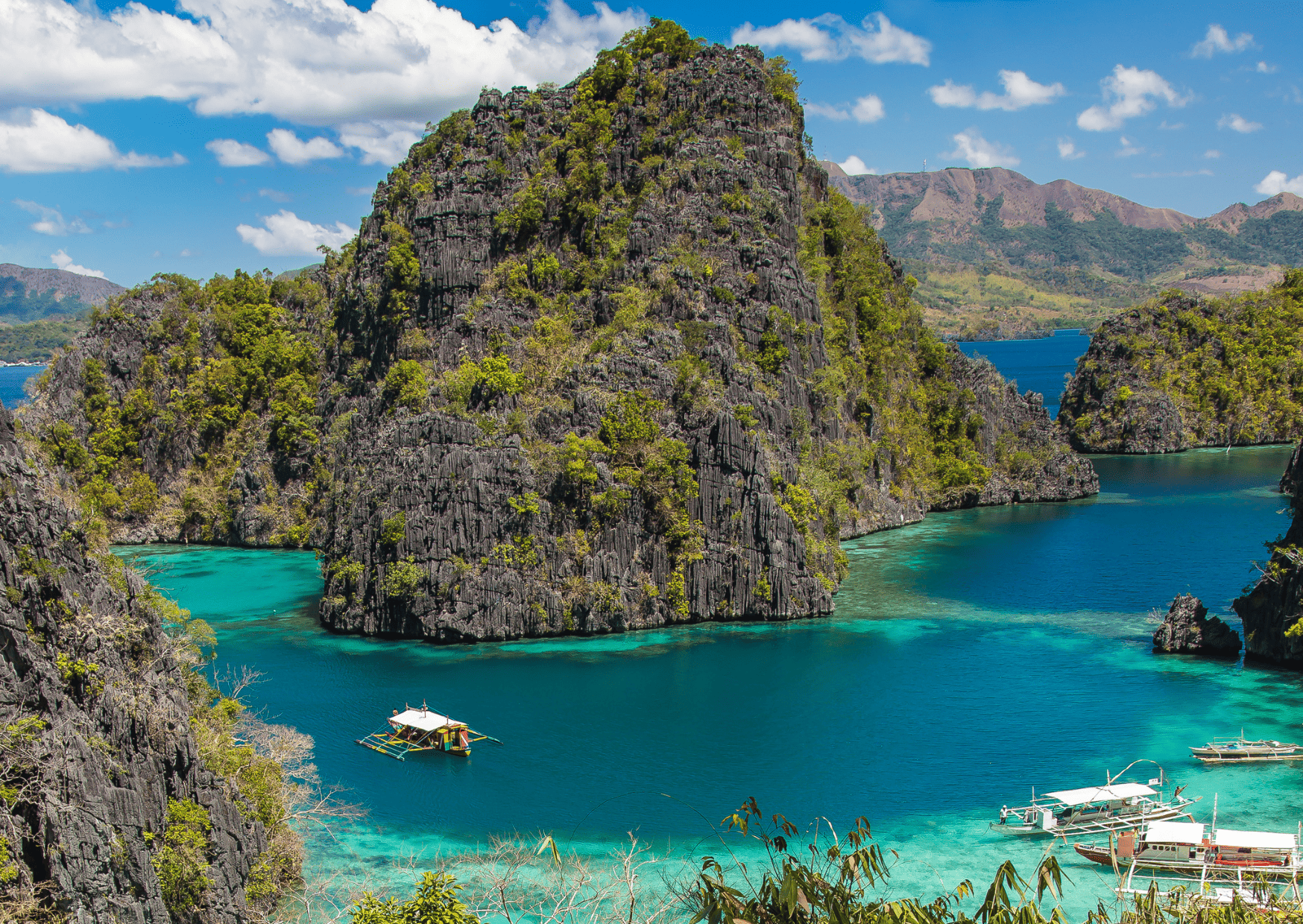 Comparison El Nido vs Coron - Which is the Better? 12 El Nido vs Coron - The Kayangan lake is in Coron, Palawan in the Philippines.