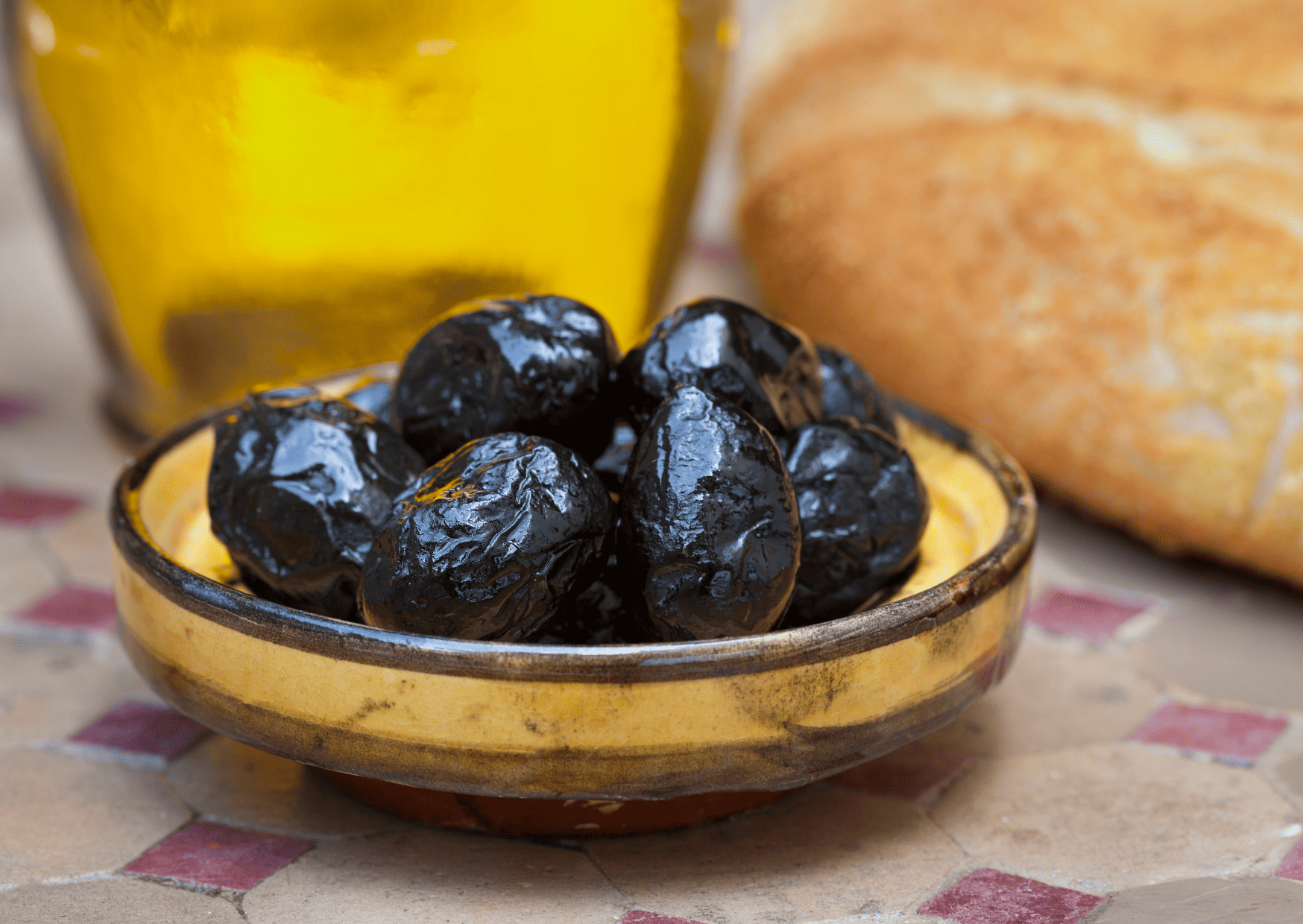 dark Moroccan olives - Breakfast in Morocco, Breakfast in Morocco - 25 Traditional Moroccan Breakfast for You To Try When Visiting Morocco, typical moroccan breakfast, best breakfast in morocco, moroccan breakfast, breakfast in morocco, traditional moroccan breakfast, moroccan breakfast foods