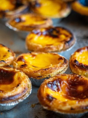 15 Common Mistakes To Avoid In Portugal, Pastel de Nata - Egg Tart - Breakfast in Portugal - Portuguese Breakfast - Traditional Breakfast in Portugal