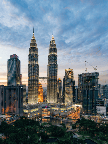 10 Amazing Countries To Live and Work Globally, Petronas Towers in Kuala Lumpur - Is Kuala Lumpur Worth Visiting