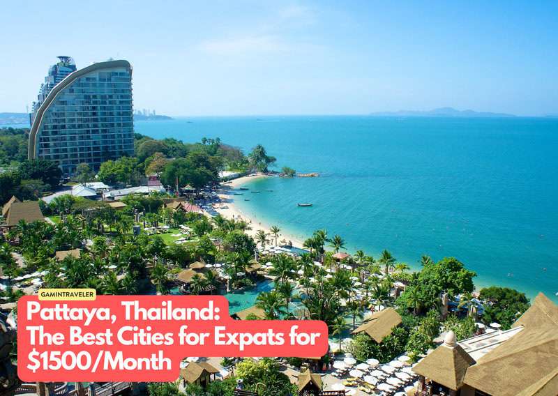a beach with trees and buildings