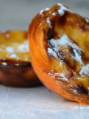 15 Best Street Food Around the World And Where To Try, 8 Reasons For Americans to Move to Portugal, 9 Must Foods to Try When Visiting Lisbon, What Made Portugal the Most Popular Tourist Destination: Key Attractions and Unique Experiences, 3 Most Popular Recipes in Portugal: Bacalhau à Brás, Caldo Verde And Pastéis de Nata, How To Make Pasteis de Nata (Recipe Guide) Tips And Calories