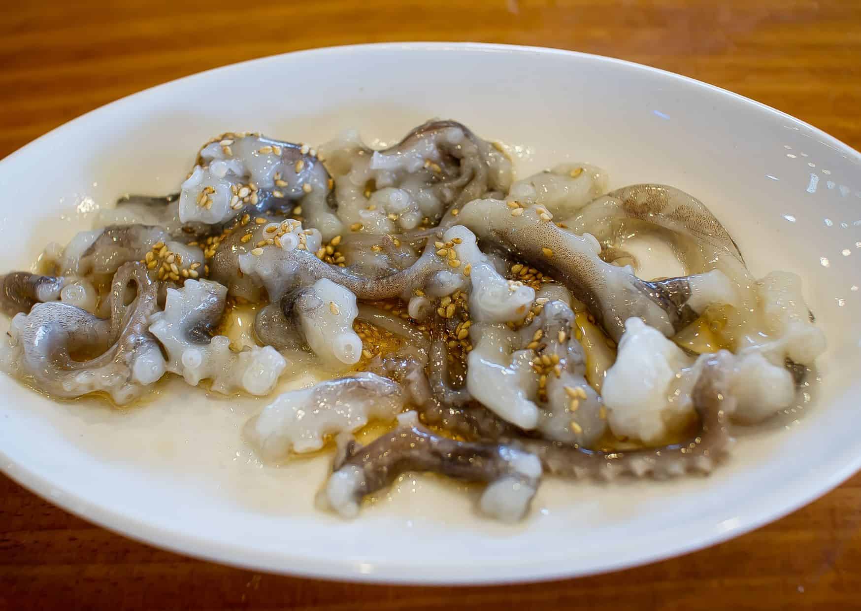 10 Weirdest Foods People Actually Eat Around the World (Would You Dare?) 7 Sannakji (Live Octopus),