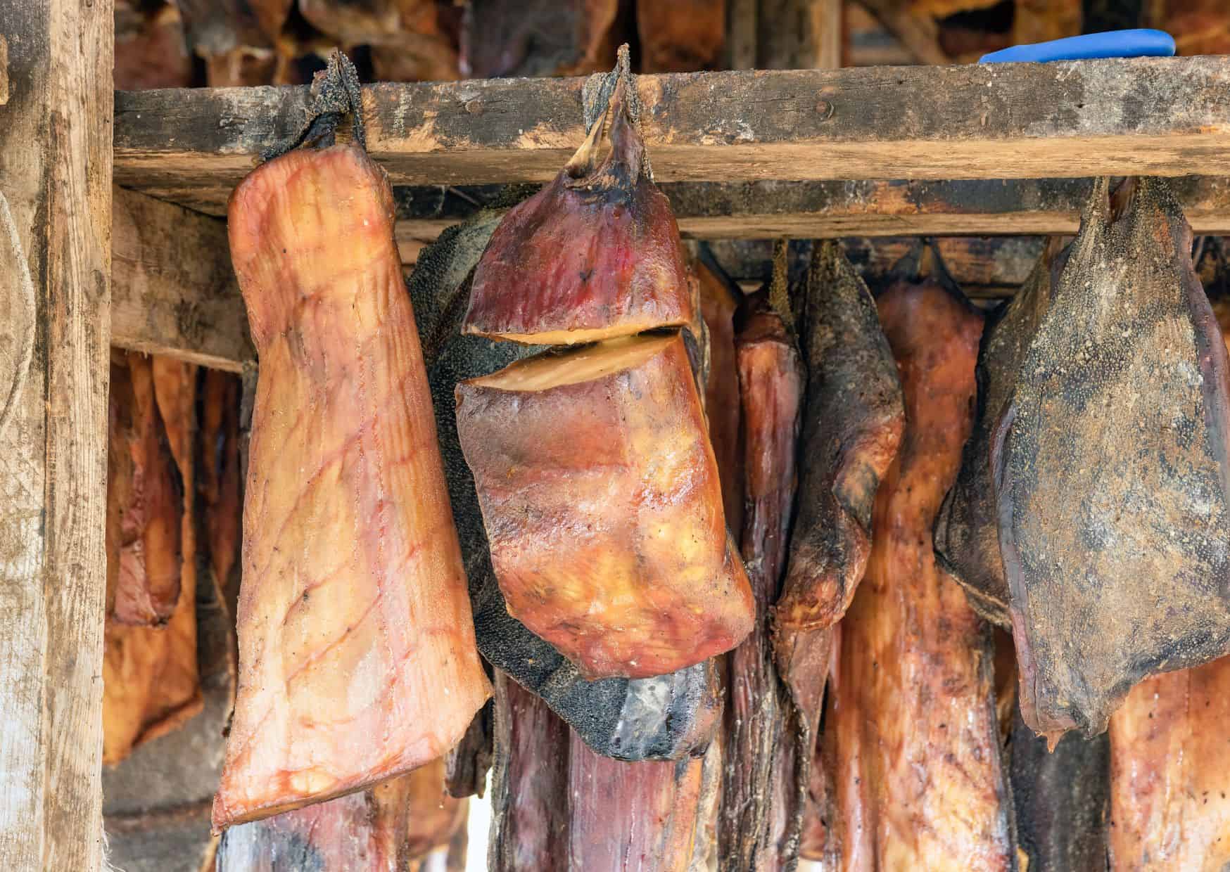 10 Weirdest Foods People Actually Eat Around the World (Would You Dare?) 1 Hakarl, Fermented shark, 10 Strangest Foods to Try Around the World