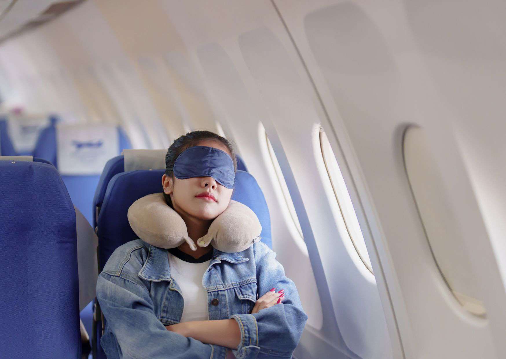 Tips to Get Better Sleep on Planes and Mistakes to Avoid