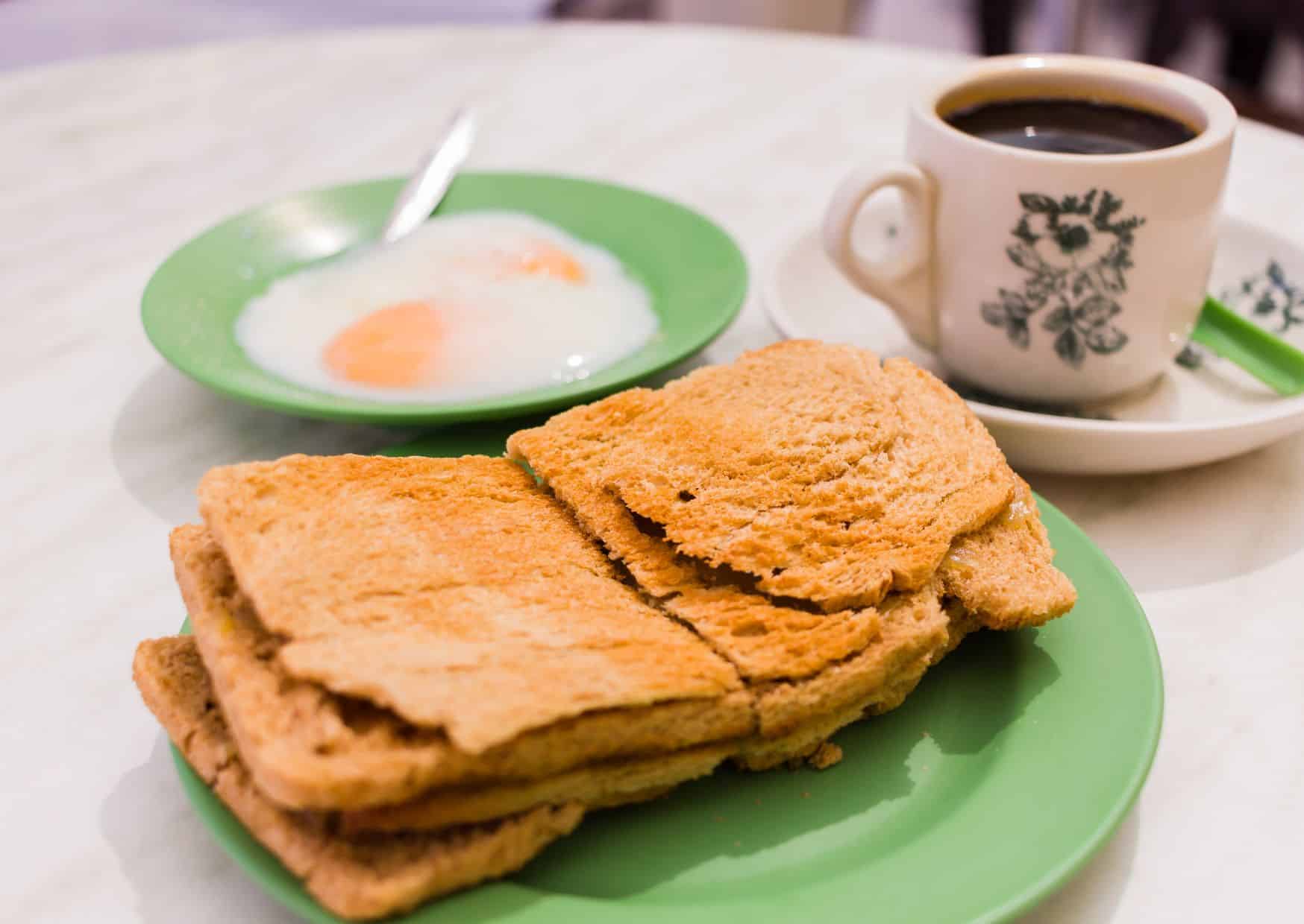 The Singaporean Breakfast That Outsiders Don’t Understand — But Locals Swear By Daily 2 Most Popular Breakfast In Singapore: How To Make Singapore Kaya Toast with Soft-Boiled Eggs (Recipe Guide)