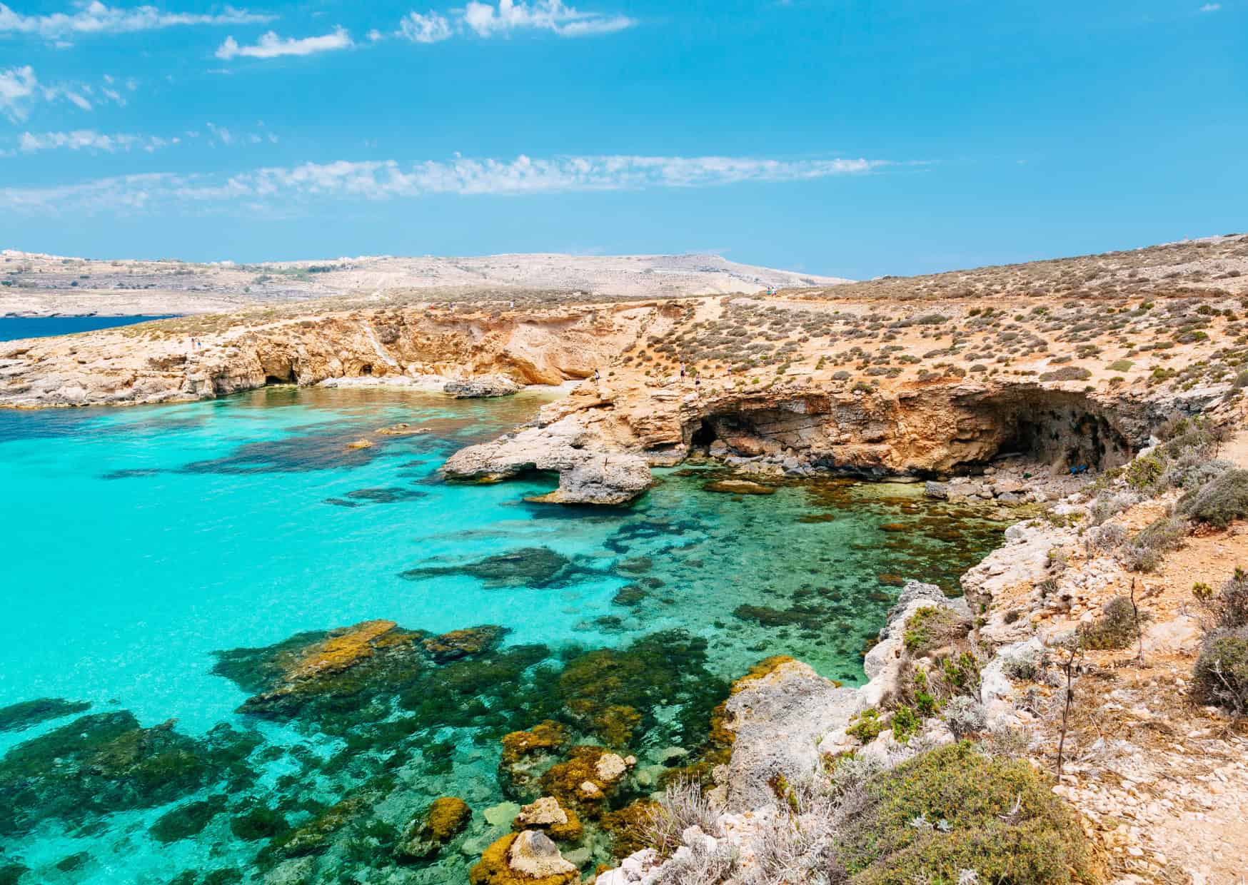 9 Digital Nomad Visa Destinations in 2025 That Feel Like a Permanent Vacation 6 Comino Blue Lagoon Malta 13 ‘Secret Offbeat European Beaches Youd Swear Are in the Caribbean