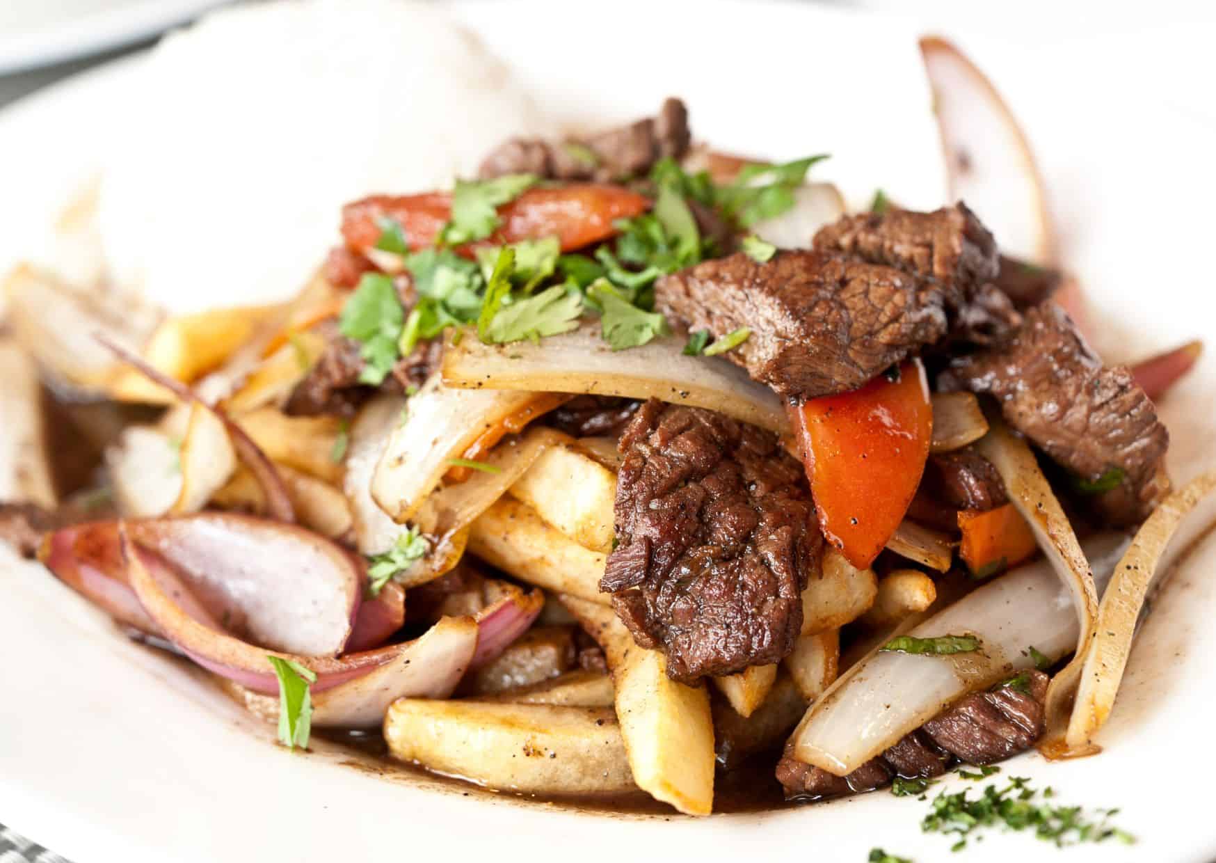 Most Delicious Foods In Peru: How to Make Peruvian Lomo Saltado (Recipe Guide)