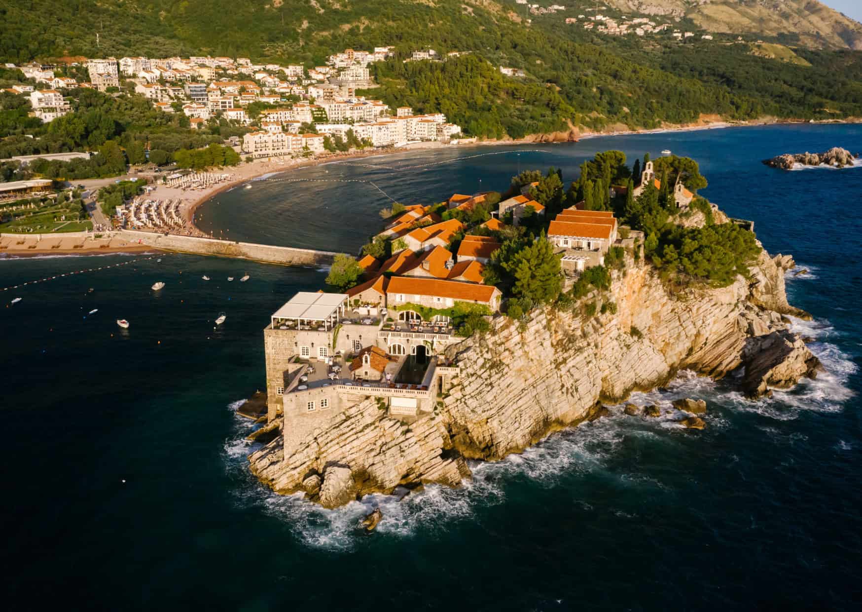 11 Countries Where $50,000 in Savings Gets You Permanent Residency - 2026 Updated List 5 Sveti Stefan Montenegro 13 ‘Secret Offbeat European Beaches Youd Swear Are in the Caribbean 1