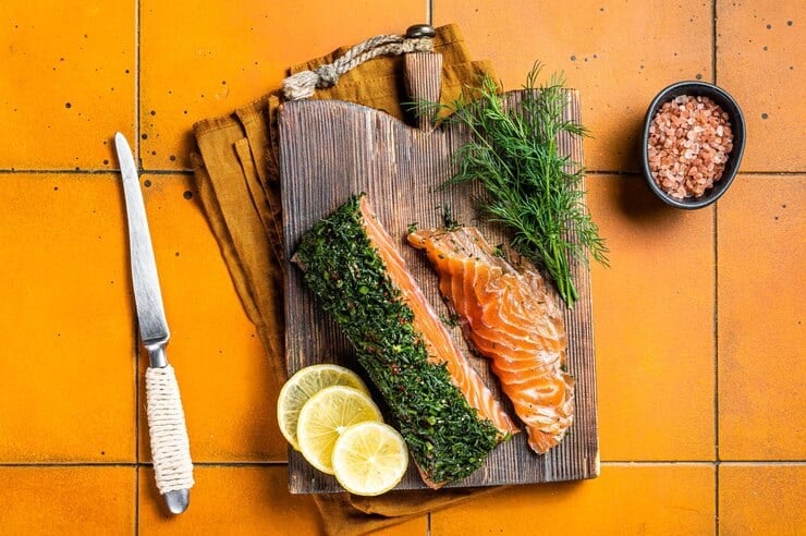 scandinavian gravlax salmon fillet with dill salt papper orange background top view 89816 43397