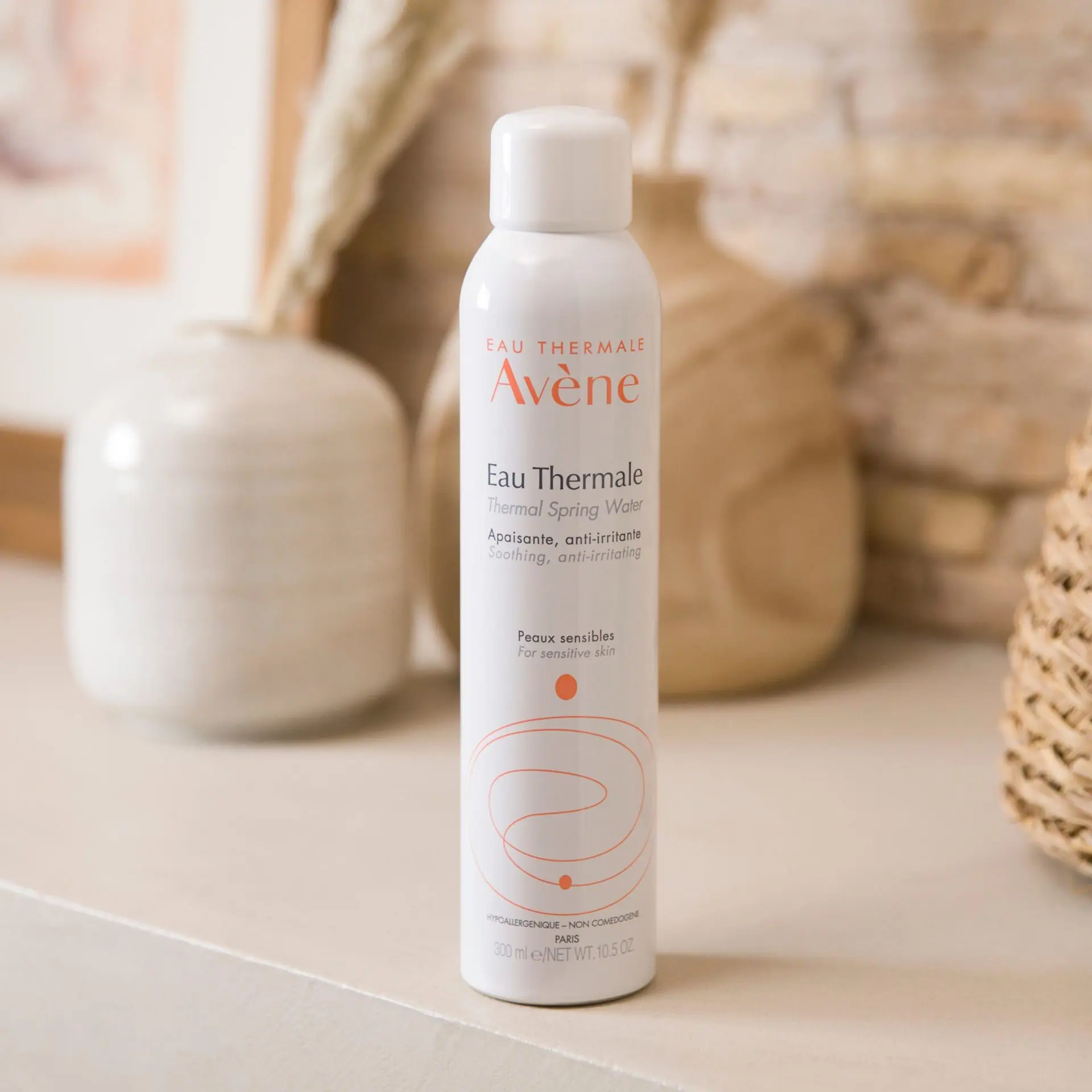 Why French Suitcases Always Contain This—and Why It Never Survives TSA 4 av thermal spring water spray scaled 1