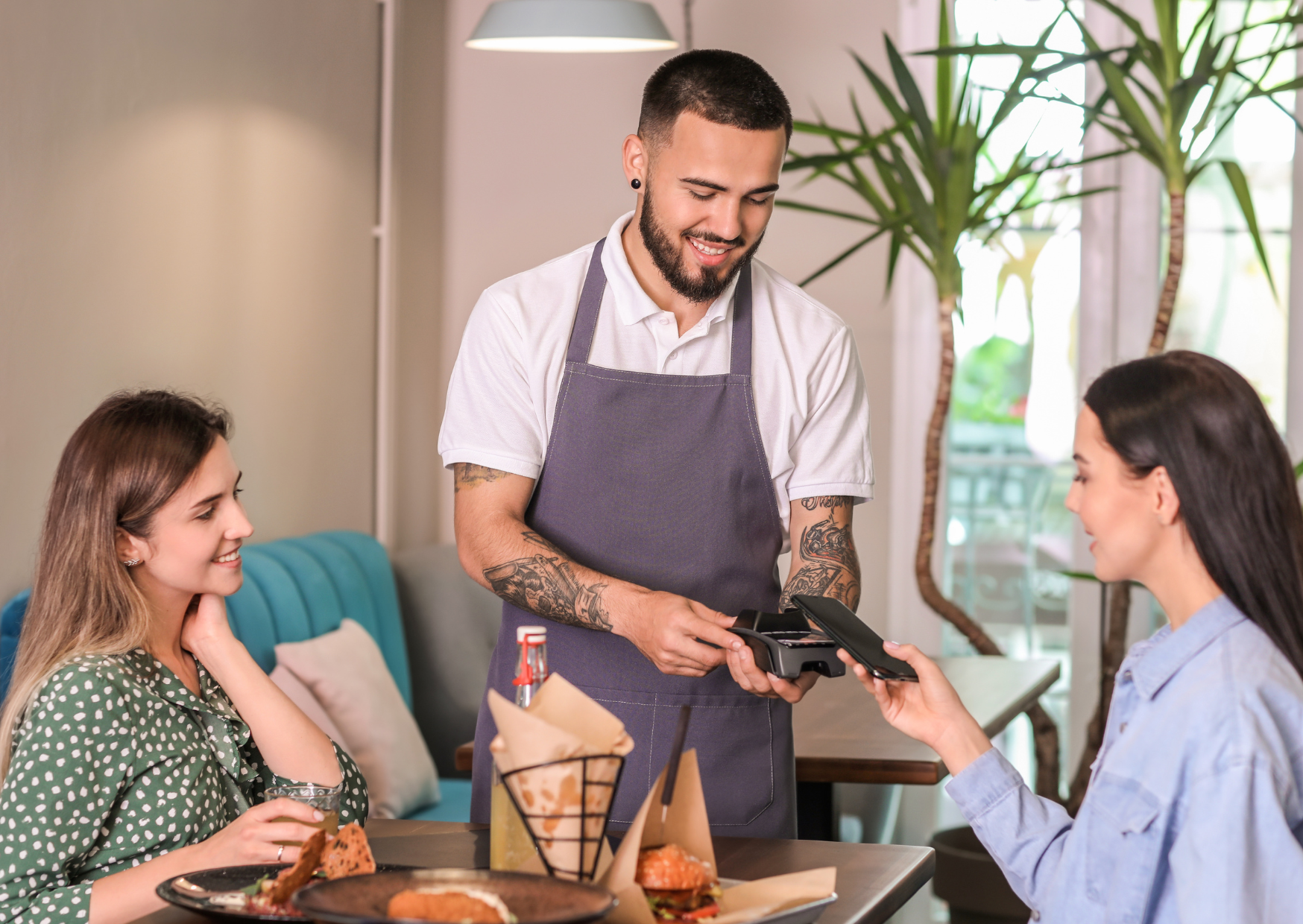 Why Splitting Checks in France Makes Waiters Hate American Groups 1 Americans splitting bills 2